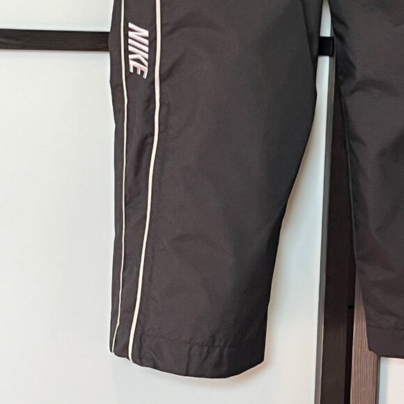 Nike Windrunner Women's High-Waisted Zipper Open-Hem Pants - Picture 4 of 13